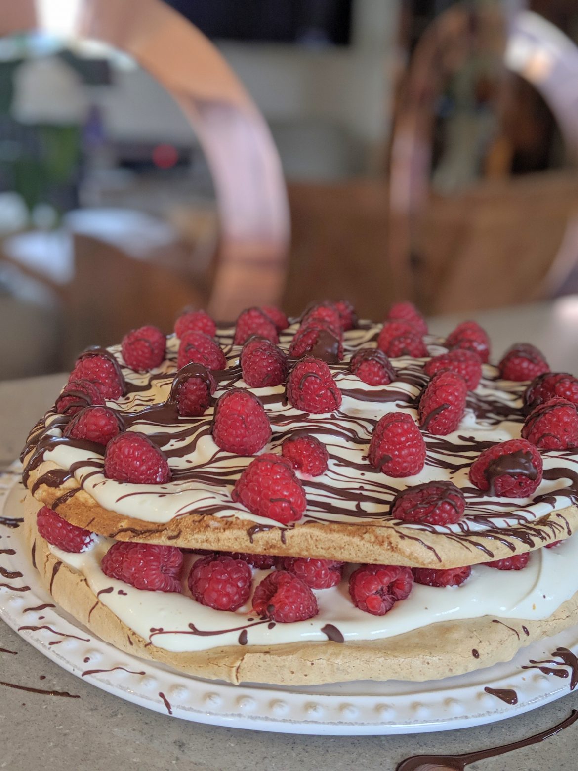 Hazelnut and raspberry meringue cake