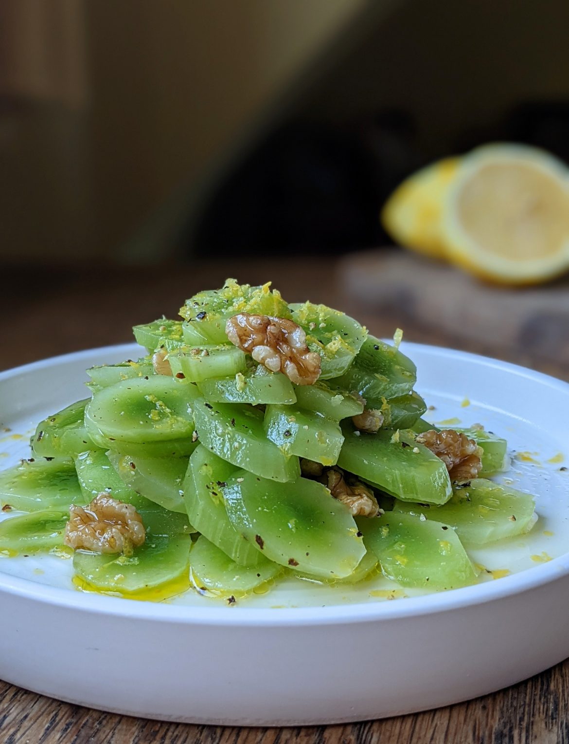 Celtuce salad with lemon and walnuts