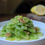 Celtuce salad with lemon and walnuts