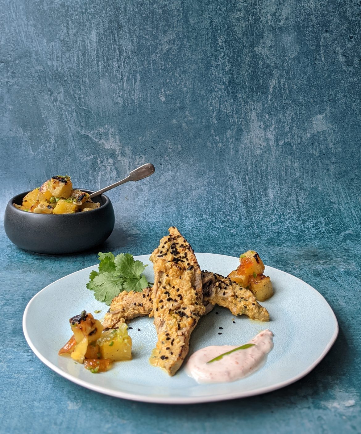 Achari pheasant with roasted pineapple and pickled yogurt.